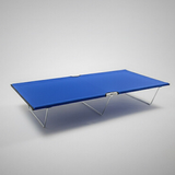 Blue folding cot on a gray background